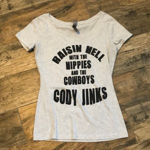Cody jinks woman’s shirt
